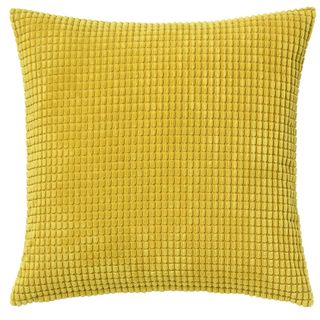 yellow cushion cover with white background
