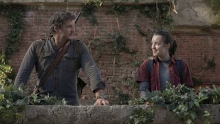 Joel and Ellie smile at one another on a rooftop in The Last of Us episode 9