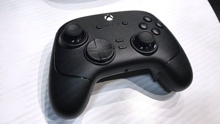 The Razer Wolverine V4 Pro Xbox controller sitting on a white table. 