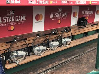 Four of the nine parabolic dishes used are seen in a dugout prior to the game.