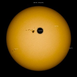 Sunspot AR 1476 compared to the size of Jupiter. Image released May 10, 2012.