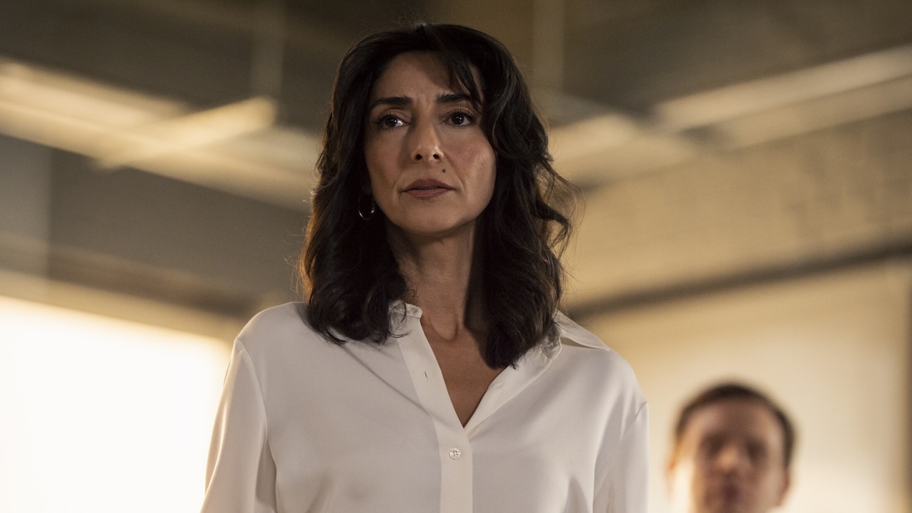 Necar Zadegan as Nikki looking worried in CIA HQ