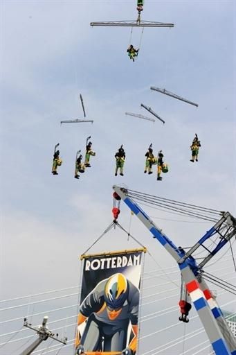 A band was suspended from a crane above the crowd in a uniquely artistic display.
