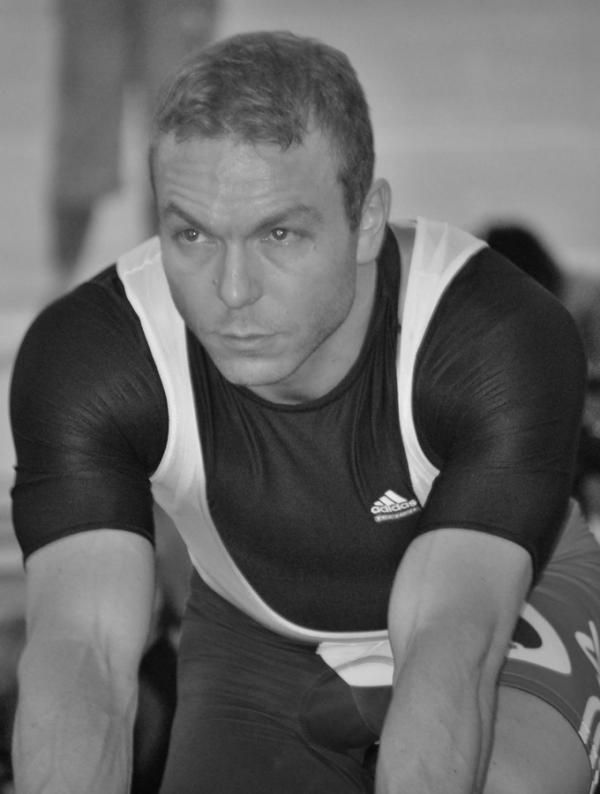 Sir Chris Hoy warms up.