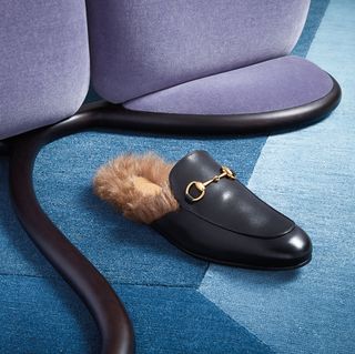 Fur-lined slippers, by Gucci