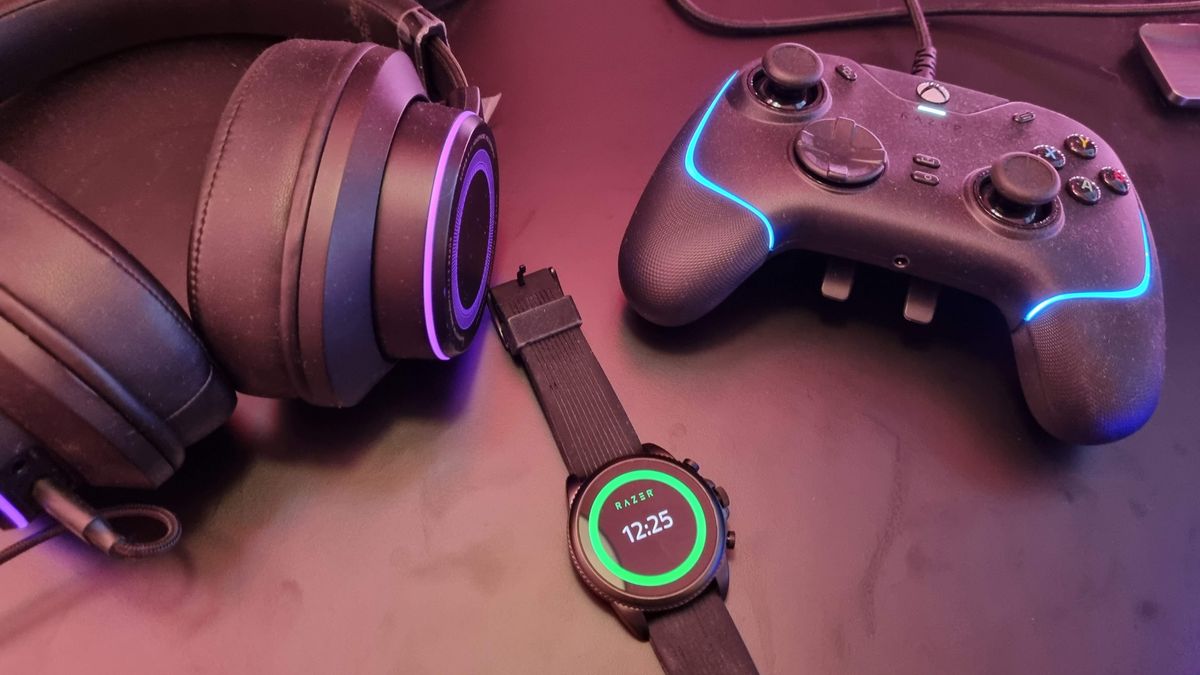 Razer X Fossil Gen 6 smartwatch on a desk with gaming peripherals