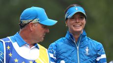 Esther Henseleit smiles next to her stand-in caddie, David Jones at the 2024 Solheim Cup