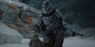 Din Djarin and The Child in The Mandalorian (2020)