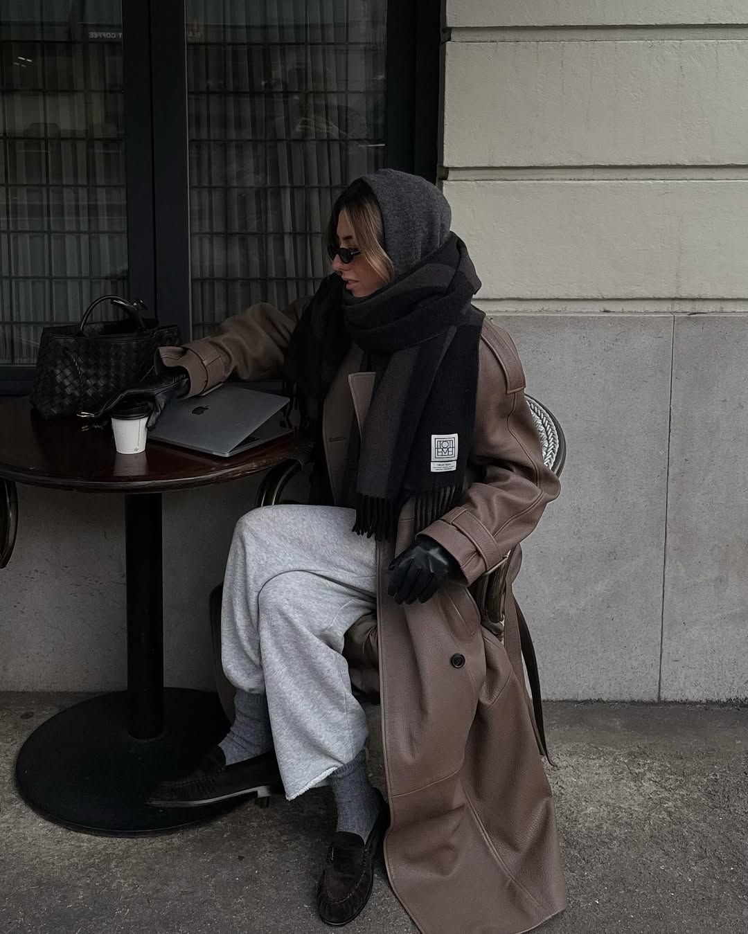 Hannah in joggers and winter coat