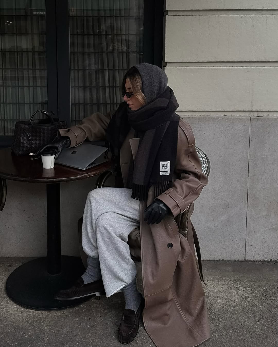 Hannah in joggers and winter coat