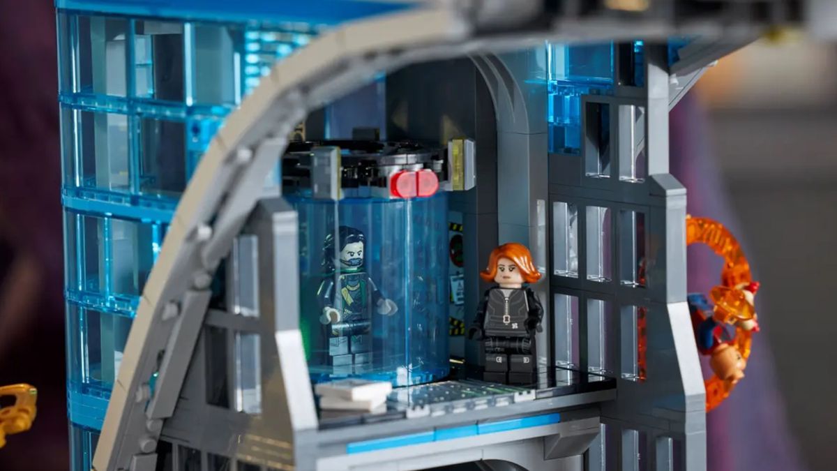 Lego Black Widow watches Lego Loki in his cage