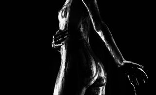 black and white image of a woman's body