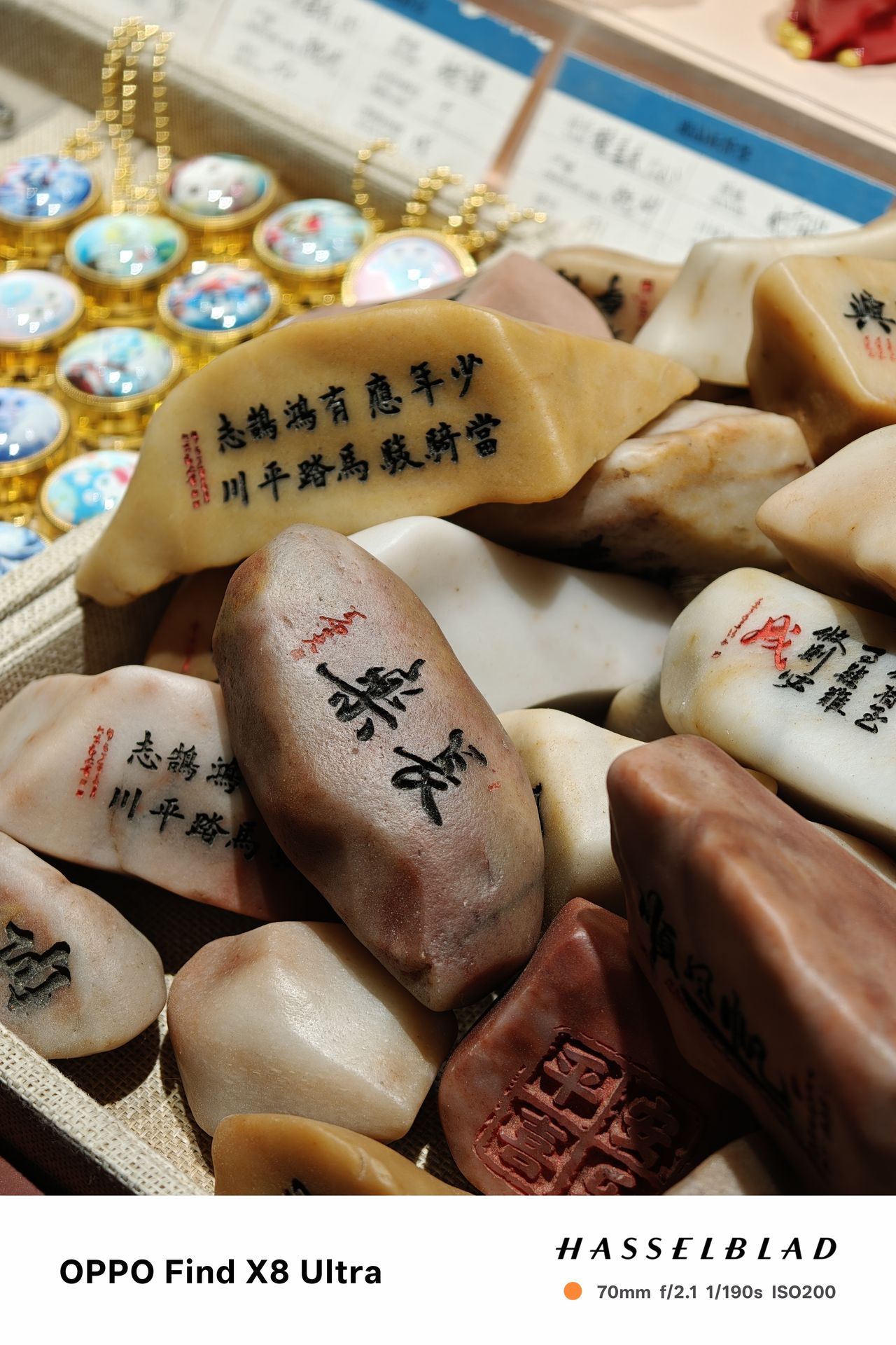 A pile of rocks with Chinese lettering printed on them