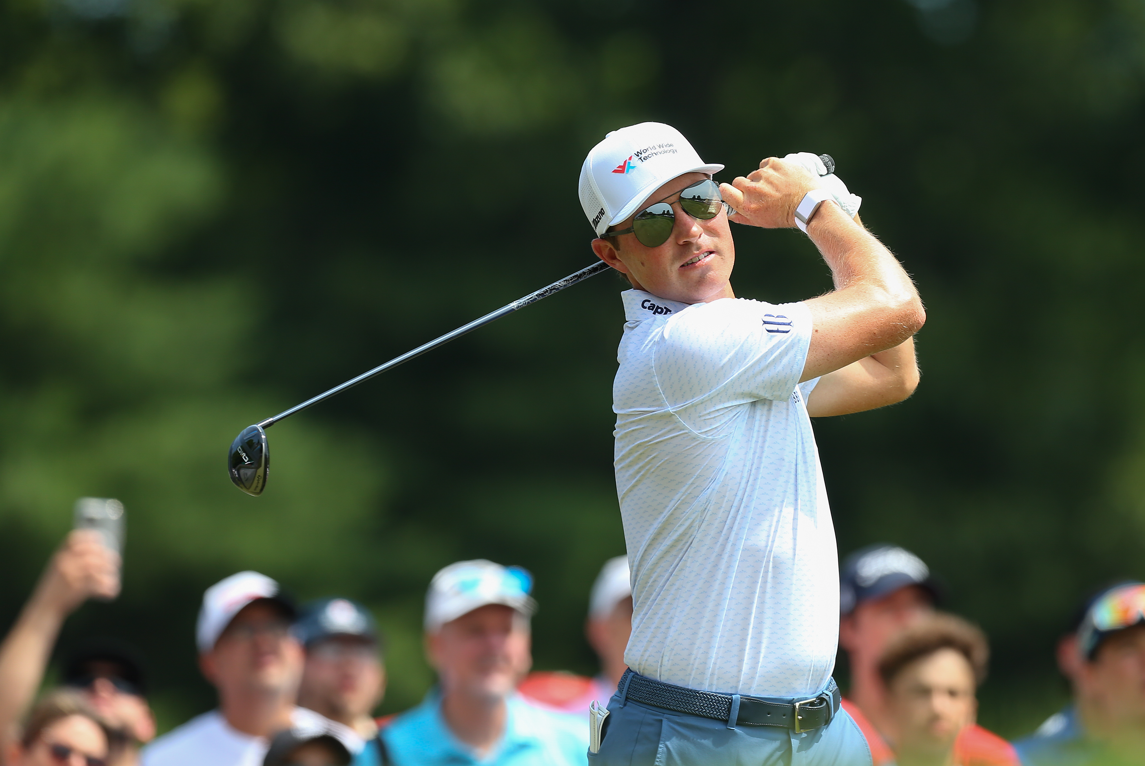 Ben Griffin hits a fairway wood off the tee