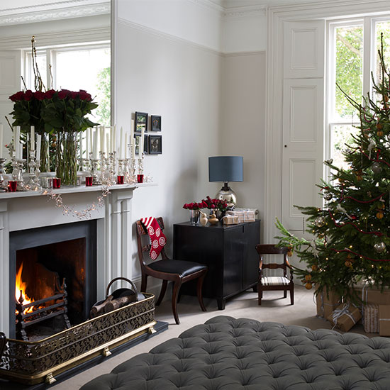 living room with fire place and flower vase