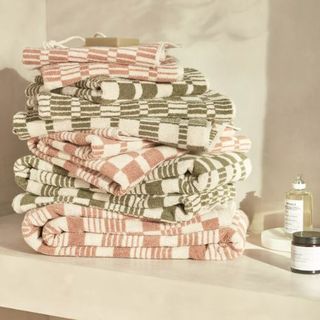 green and pink patterned hand towels