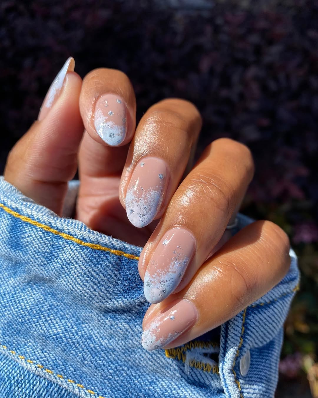 light blue and white frosty manicure