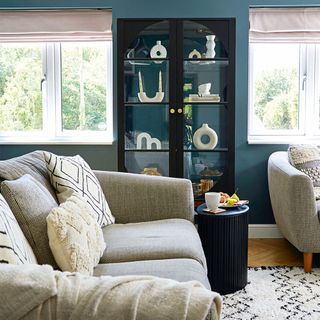 blue living room with sofa