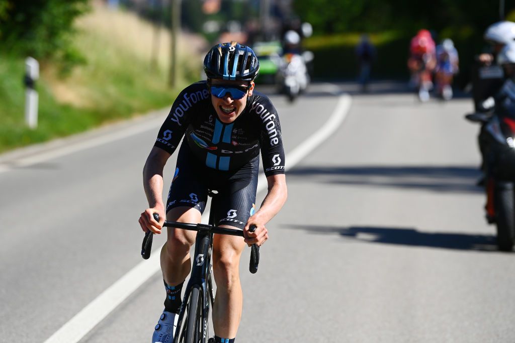 AESCH SWITZERLAND JUNE 13 Andreas Leknessund of Norway and Team DSM attacks in the breakaway during the 85th Tour de Suisse 2022 Stage 2 a 198km stage from Kusnacht to Aesch ourdesuisse2022 WorldTour on June 13 2022 in Aesch Switzerland Photo by Tim de WaeleGetty Images