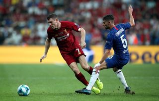 The midfielder formerly known as Jorginho tangles with Liverpool's James Milner