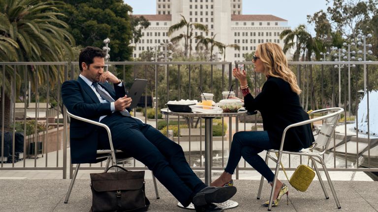 Manuel Garcia-Rulfo as Mickey Haller, Becki Newton as Lorna in episode 101 of The Lincoln Lawyer