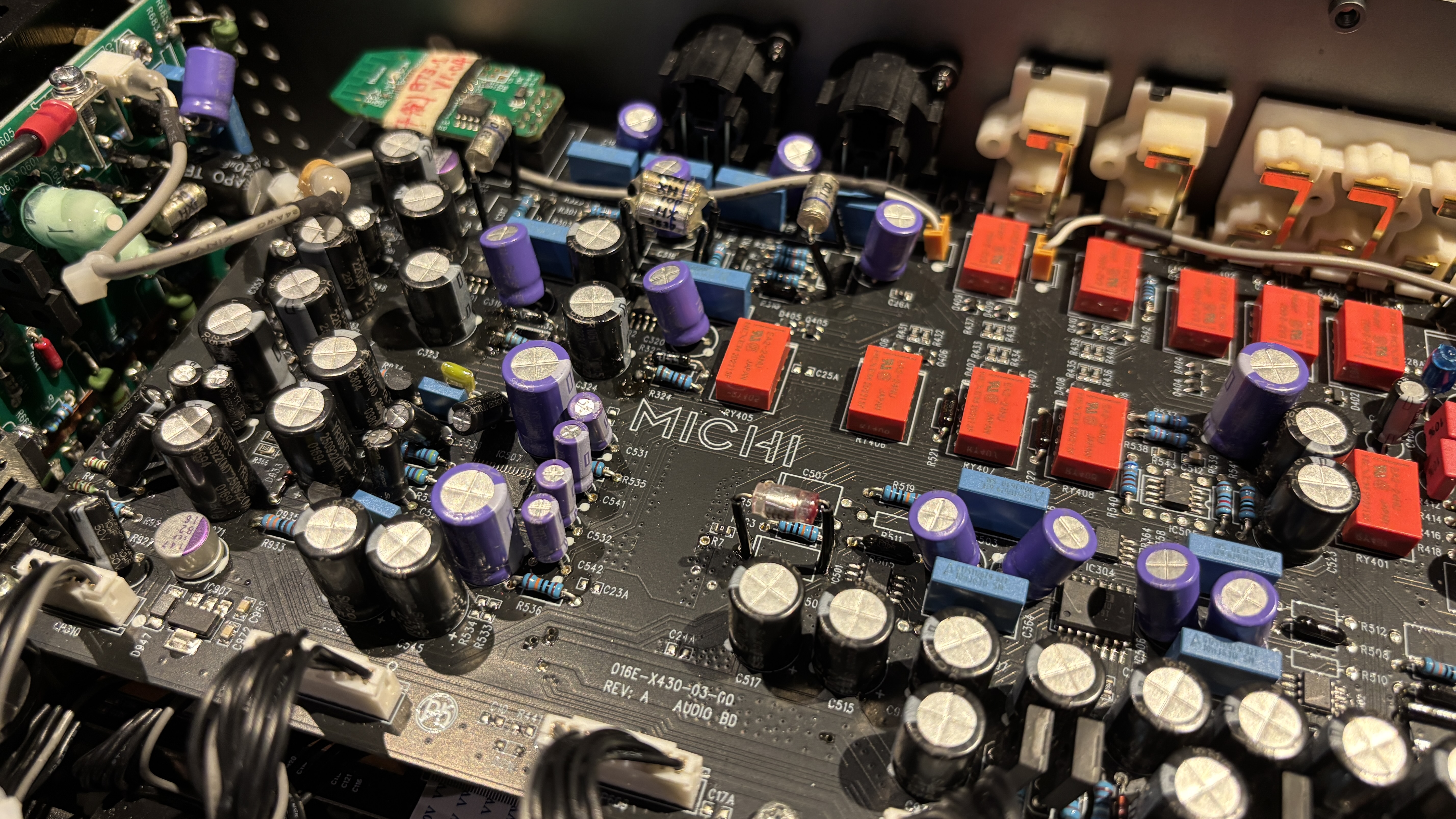 A picture of the top of the main circuit board from inside a Michi Prestige X430 stereo amplifier