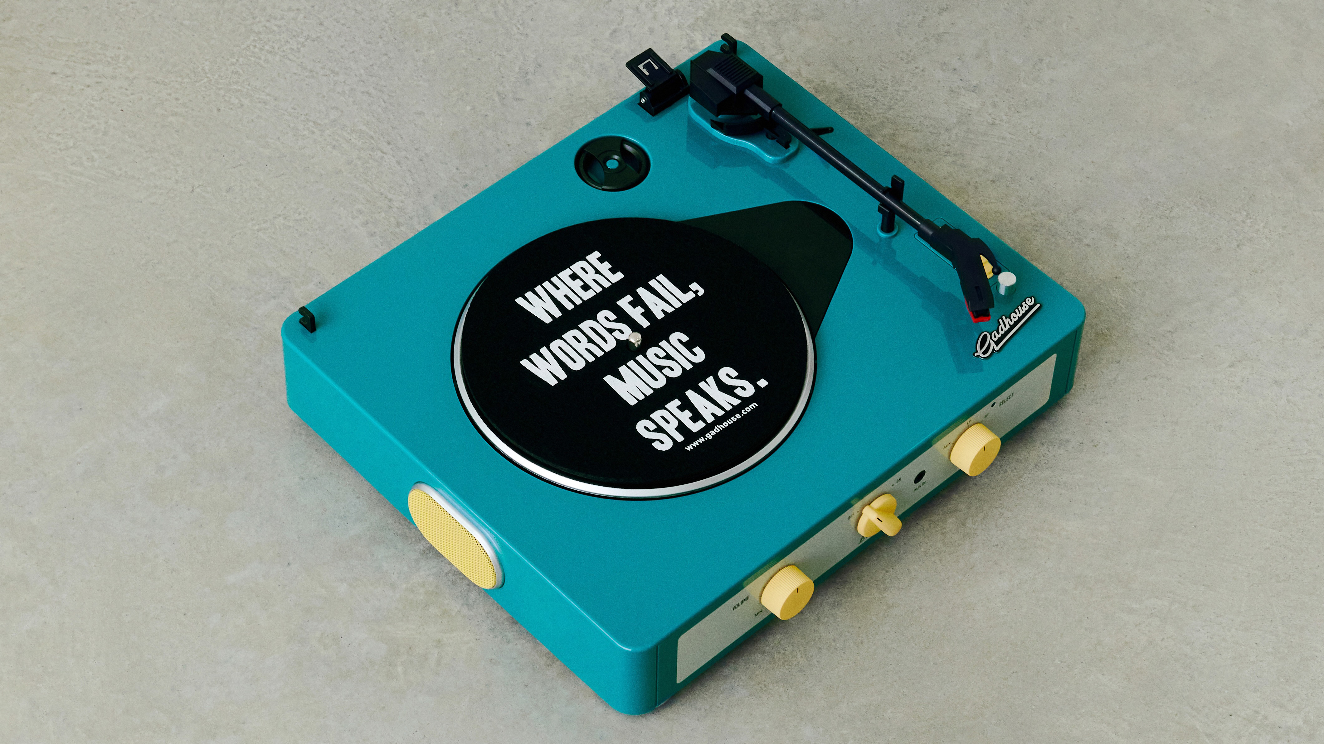 Gadhouse Retro Brad Mk II record player in blue, on a grey surface