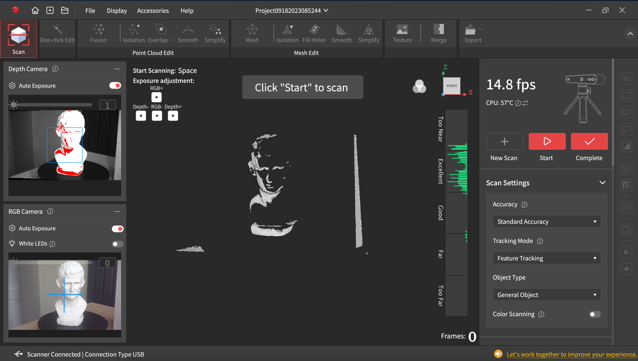 A Revopoint INSPIRE 3D Scanner on a desk, along with an object to scan and a laptop