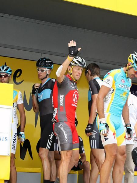 Lance Armstrong (Team Radioshack) waves to the crowd.