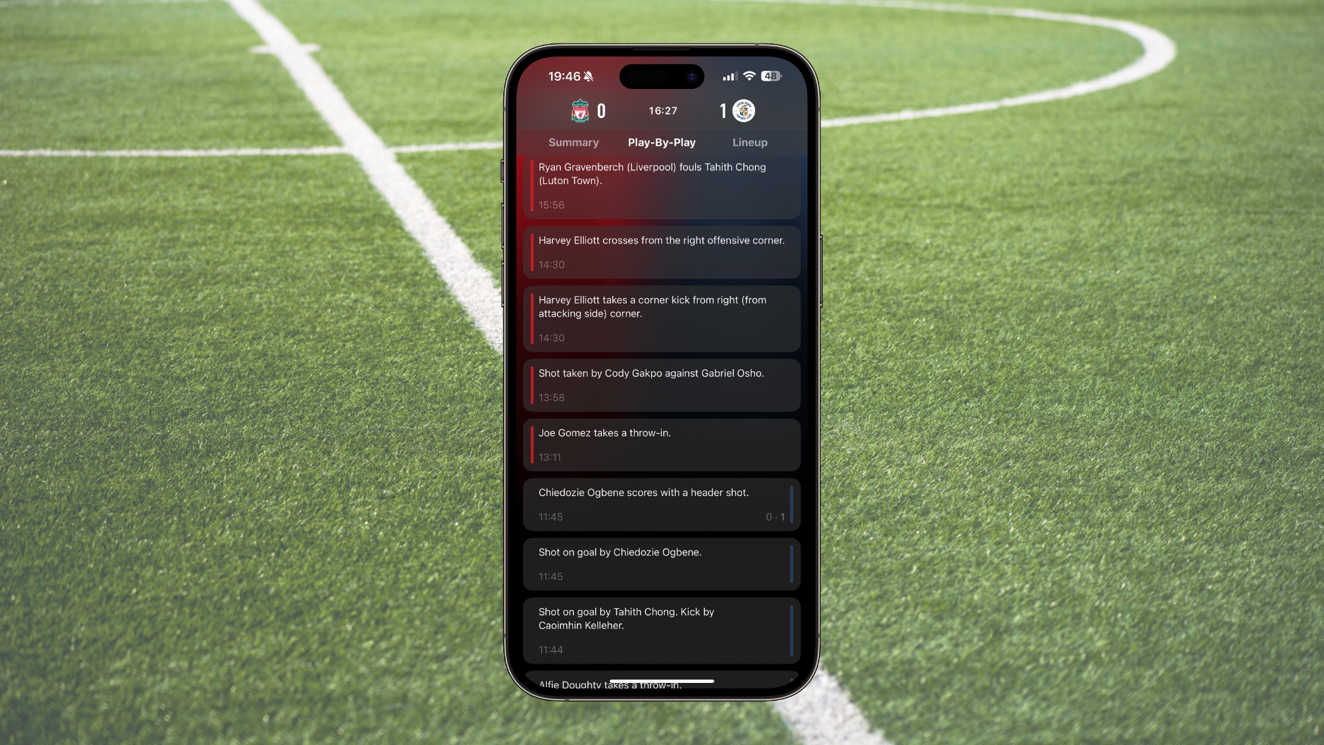 Apple Sports on an iPhone 15 Pro Max frame with a football pitch as background