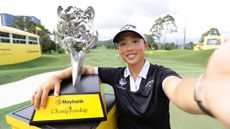 Ruoning Yin takes a selfie of her and the Maybank Championship trophy in 2024