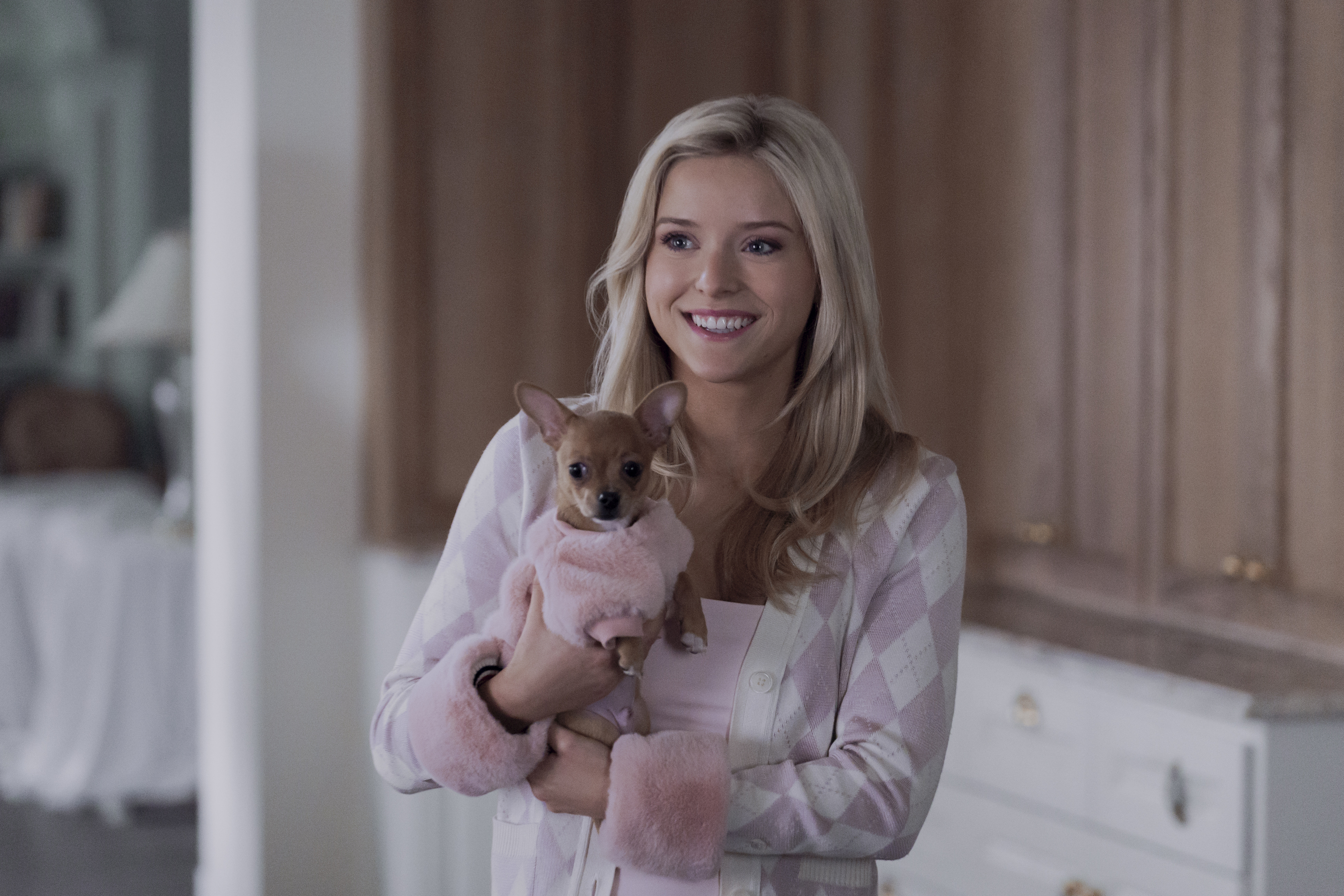 Lexi Minetree wearing an argyle sweater in Elle