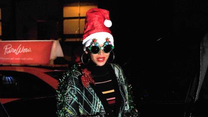 Beyoncé dressed as a Christmas tree.