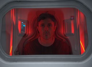 An astronaut in a hypersleep chamber aboard a spaceship