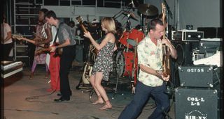 Talking Heads live in 1980, with Adrian Belew and his number on Strat on the far-right