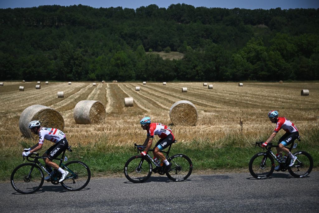 BoraHansgrohe teams Austrian rider Felix Grossschartner L Lotto Soudal teams Belgian rider Philippe Gilbert C and Lotto Soudal teams Belgian rider Tim Wellens R cycle in a breakaway during the 16th stage of the 109th edition of the Tour de France cycling race 1785 km between Carcassonne and Foix in southern France on July 19 2022 Photo by AnneChristine POUJOULAT AFP Photo by ANNECHRISTINE POUJOULATAFP via Getty Images