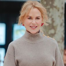 Nicole Kidman arrived at the Chanel cruise fashion show in France wearing a sweater skirt set for spring