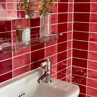 Pink and red striped tiles in bathroom