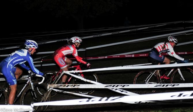 Katie Compton (Trek Cyclocross Collective) leading Anderson and Nash through a maze of tape