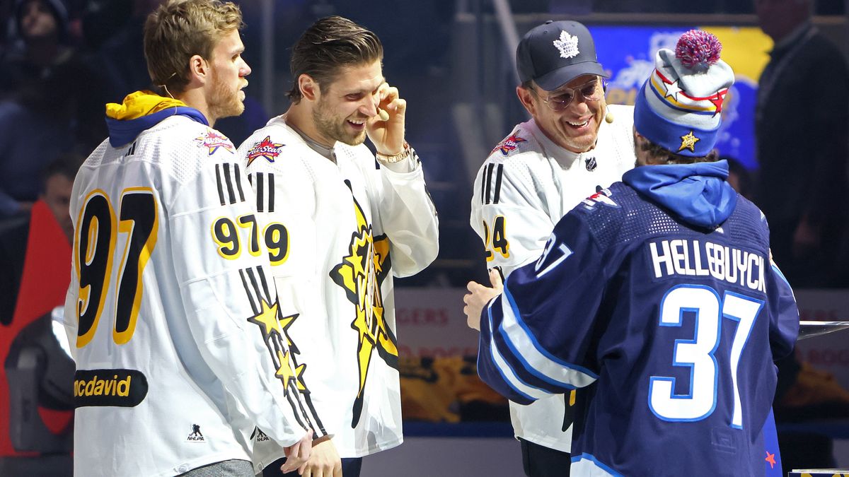 Connor Mcdavid #97 and Leon Draisaitl #29 of the Edmonton Oilers and Actor Will Arnett select Connor Hellebuyck #37 of the Winnipeg Jets during 2024 NHL All-Star Thursday