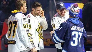 Connor Mcdavid #97 and Leon Draisaitl #29 of the Edmonton Oilers and Actor Will Arnett select Connor Hellebuyck #37 of the Winnipeg Jets during 2024 NHL All-Star Thursday