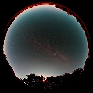Jesper Grønne of Silkeborg, Denmark used a fisheye lens to make this image of Draconid meteors in October, 2011.