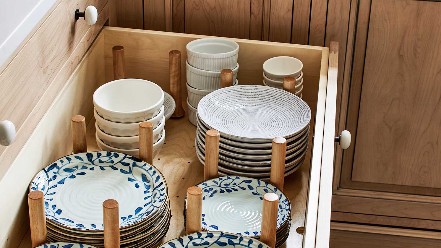 What's the best way to store dishes in a kitchen?