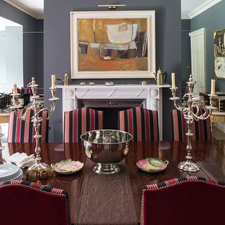 dining room with fireplace and dining table