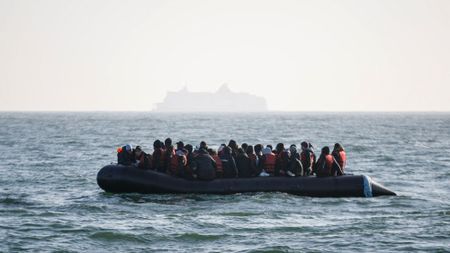 Migrants crossing the English channel in a small boat