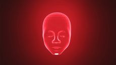 AI concept image showing humanoid face illuminated in red against a glowing red and black background.