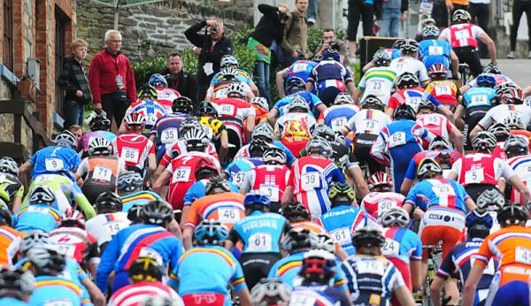 Roger Walder (Swiss) leads the junior peloton uphill.