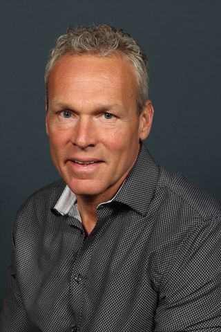 Smiling headshot of Todd Eddy.