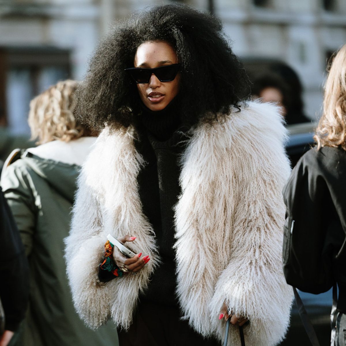 julia sarr-jamois wearing a white mongolian shearling coat 