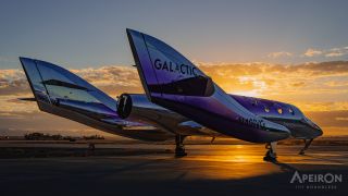 A shiny purple space plane stands on a runway slightly silhouetted by a setting sun.